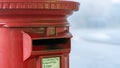 Old red post box on a foggy morning Royalty Free Stock Photo