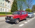 Old red private small city compact car Fiat Panda 45 parked