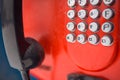 An old red push-button street phone-payphone. Royalty Free Stock Photo