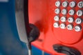 An old red push-button street phone-payphone. Royalty Free Stock Photo