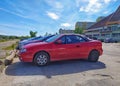 Old red Renault Megane I cabrio parked