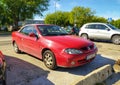 Old red Renault Megane I cabrio parked