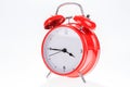 Old red retro alarm clock isolated Royalty Free Stock Photo