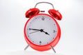 Old red retro alarm clock isolated Royalty Free Stock Photo