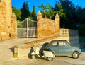 An old red retro Italian Vespa scooter