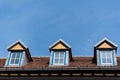 Old red roof and dormer windows Royalty Free Stock Photo