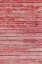 Old red shabby wooden planks with cracked color paint Royalty Free Stock Photo
