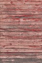 Old red shabby wooden planks with cracked color paint Royalty Free Stock Photo