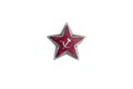 Old red star from military cap isolated on the white background