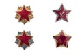Old red stars from military caps isolated on the white background