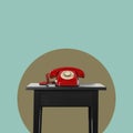 old red telephone on a black table Royalty Free Stock Photo