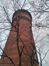 Old red tower background. Brick wall construction. Vintage architecture Royalty Free Stock Photo