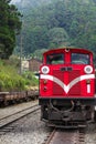 The old red Train in Alishan Line & x28;downhill& x29; come back to Chiyi train station at foggy day Royalty Free Stock Photo