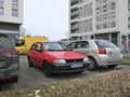 Old red veteran classic Japanese compact small car Toyota Starlet 1.3 LXi parked Royalty Free Stock Photo