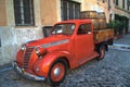 Old red vintage car in the center of Rome, Italy Royalty Free Stock Photo