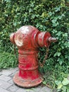 Old red water hydrant Royalty Free Stock Photo
