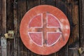 Old red weathered street sign on wood wall Royalty Free Stock Photo