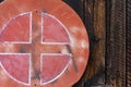 Old red weathered street sign on wood wall Royalty Free Stock Photo