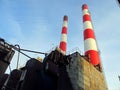 Old red and white industrial chimneys Royalty Free Stock Photo