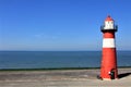 An old red and white lighthouse in Westkapelle, Netherlands