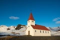 Old red wooden church at sunset, Vik town, Iceland Royalty Free Stock Photo