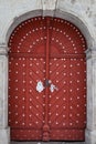 Old red wooden door in castle Royalty Free Stock Photo