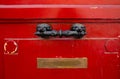 Old red wooden door with decorativel handle and Inbox Royalty Free Stock Photo