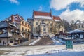 Old renaissance houses and church in Kazimierz Dolny, Poland Royalty Free Stock Photo