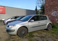 Old Renault Megane hatchback second model four doors parked