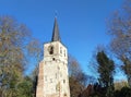 Old renovated bell tower in Muizen-Mechelen, Belgium, remains of the church of Saint-Lambert after bombardment in ww2 Royalty Free Stock Photo