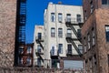 Old Residential Brick Apartment Buildings with Fire Escapes in Nolita of New York City