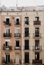 Old residential building with cozy balconies, Barcelona, Spain, vertical Royalty Free Stock Photo