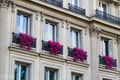 Old residential building front with flowers, Paris.