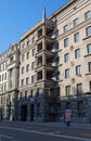 An old residential building on Kamennoostrovsky Prospekt No. 73-75. Summer urban landscape.