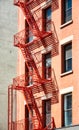 Old residential building with red fire escape, New York City, USA Royalty Free Stock Photo