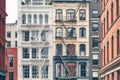 Old residential buildings with iron fire escapes, color toning applied, New York City, USA Royalty Free Stock Photo