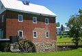 Old Restored brick Gristmill and Footbridge