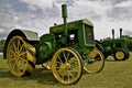 Old restored John Deere tractors on display