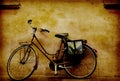 Old retro bicycle against a grungy wall in italy Royalty Free Stock Photo