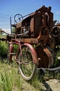 Old retro bike and tractor Royalty Free Stock Photo