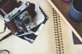 Old retro camera on aged photo album Royalty Free Stock Photo