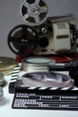 Old retro camera, film clapper, rolls of film and a 35mm boxes f Royalty Free Stock Photo