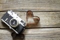 Old retro camera with heart love photography concept