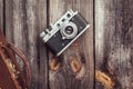 Old retro camera on vintage wooden boards Royalty Free Stock Photo