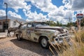 Old retro car decoration with elk statue at Grand canyon railway junction