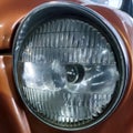 Old retro car headlight close view photo Royalty Free Stock Photo