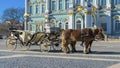 Old Retro Carriage In Front Of Winter Palace Hermitage Museum On Palace Square In St. Petersburg, Russia. Historical Old-