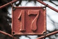 Old retro cast iron plate number 17