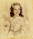 Old retro Christmas portrait of child girl. Royalty Free Stock Photo