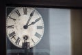 Old retro clock with roman numerals Royalty Free Stock Photo
